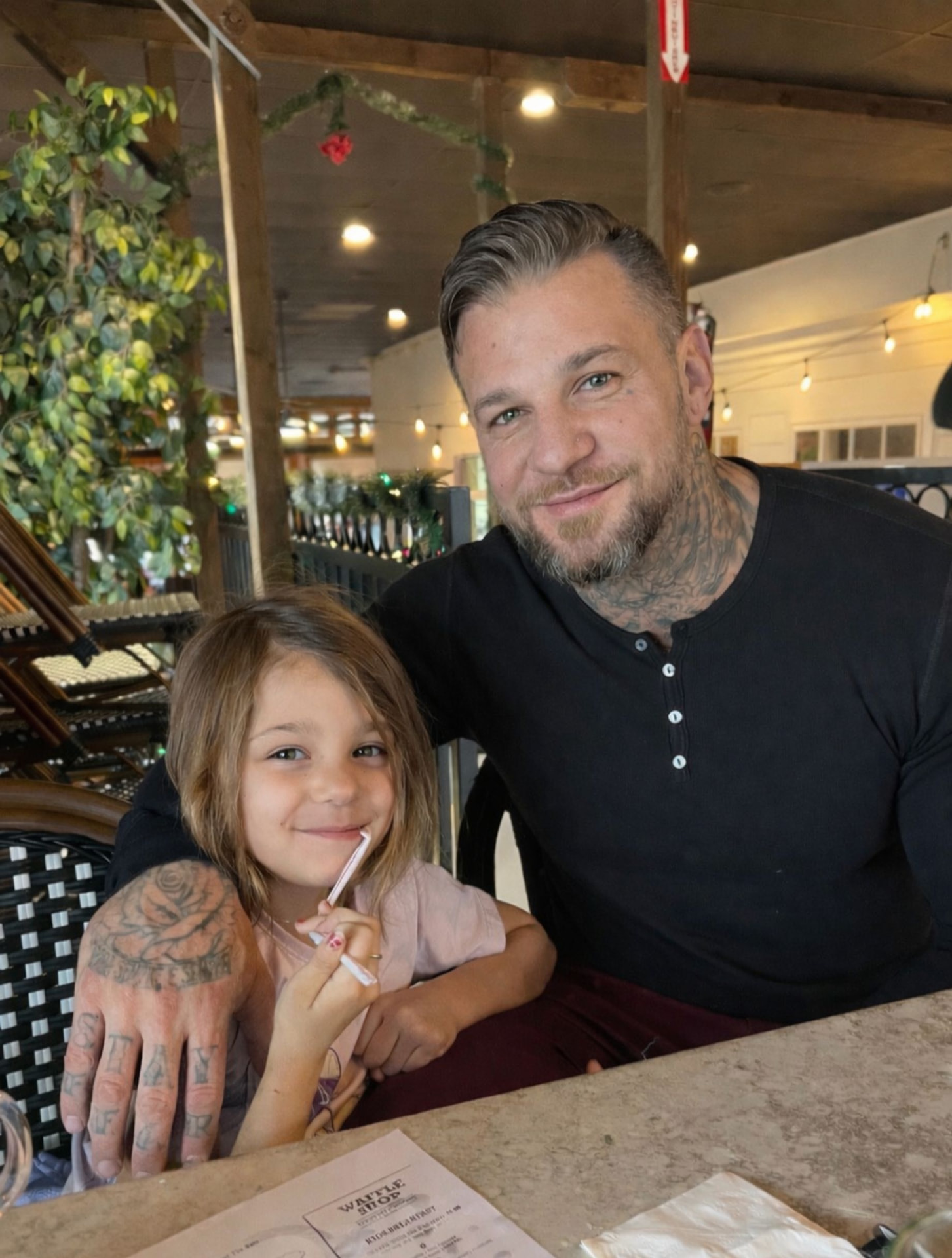 Travis Nunes and his daughter out for breakfast together